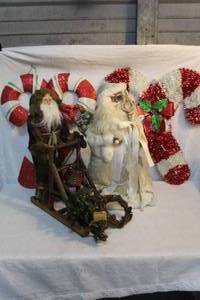 lot 122 image: Christmas lot 2 Santas and two candy cane deco