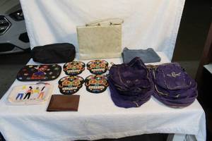 lot 215 image: Mixed lot 4 sugar skull coasters and many crown Royal bags and much more see pictures
