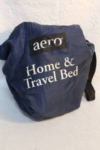 lot 27 image: Air mattress with pump in a bag it pump is missing plug