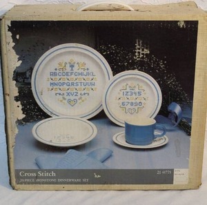 lot 19 image: This is a cross-stitch set of 20 dinnerware  set was unopened so I left it that way