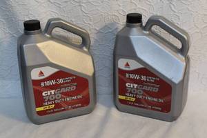 lot 191 image: Heavy duty engine oil 10w-30 they are unopened and (This is times two the bid )