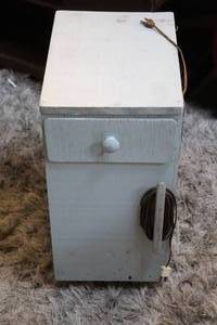 lot 190 image: Cabinet on caster wheels with light on the bottom see picture took pictures all around and top and bottom
