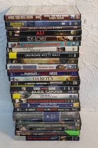 lot 181 image: lot of DVDs  movies like whats happening,good times, Alex cross, superman, and many more