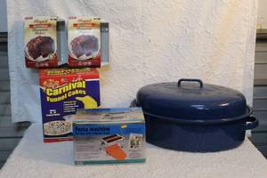 lot 150 image: Roster pot,pasta machine, funnel cake kit,and 2 microwave brownie makers