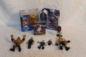 lot 152 image: 2 DC Spider-Man toys unopened Godzilla toy unopened and a hand full of previously loved action figures