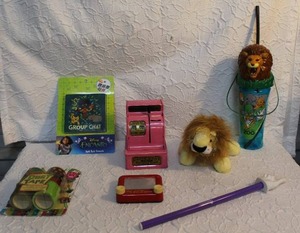 lot 155 image: Register piggy bank that opens after getting to $10 counts quarters nickels dimes , lion plush and cup, small etch A Sketch, and more see pictures