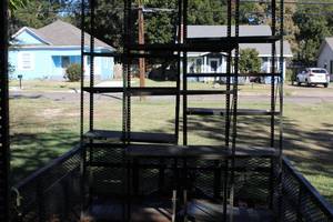 lot 234 image: 3 metal shelves will add size they are tall
