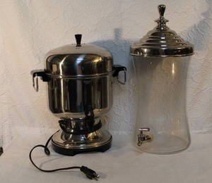 lot 236 image: Farberware stainless steel coffee urn, and beverage dispenser, also known as a drink dispenser.