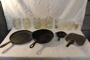 lot 253 image: 3-Cast iron pans and more see pictures