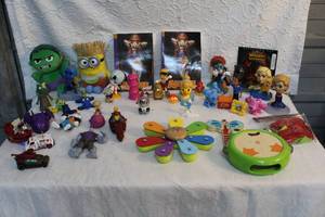 lot 261 image: Mixed lot of toys and plushies and Anima books and more see all pictures