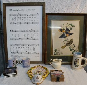 lot 269 image: Thomson Pottery Lighthouse pattern mug. And lighthouse coasters and vintage Italian ceramic wall pocket. And so much more see pictures