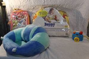 lot 296 image: Baby lot with tummy time pillows and toy