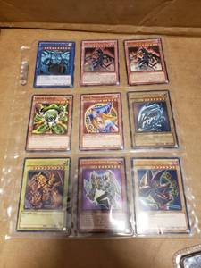 lot 7A image: YU GI OH CARDS INCLUDES 9 CARDS