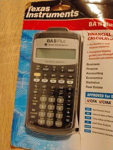lot 89 image: TEXAS INSTRUMENTS CALCULATOR BA II PLUS IN ORIGINAL PACKAGE