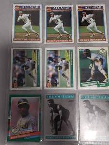 lot 63 image: 15 RANDOM RICKEY HENDERSON BASEBALL CARDS