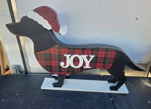lot 29 image: Glitzhome - Wood Metal Dachshund Standing Front Door Porch Sign for Christmas, Indoor Outdoor Welcome Joy Sign 16