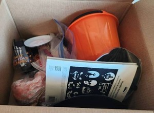 lot 111 image: Box of Halloween decorations and mask