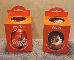 lot 31 image: Selection of 2 vintage 1993 Enesco Coca Cola handmade decoupage Christmas Ornaments
