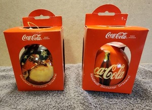 lot 48 image: Selection of 2 vintage 1993 Enesco Coca Cola handmade decoupage Christmas Ornaments