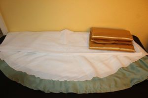 lot 76 image: Oval Shaped table Cloths and table runner