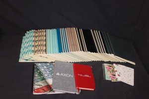 lot 104 image: Large amount of blank Notebooks