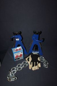 lot 9 image: Automotive repair Items, Jack Stands, Tire Stops, Chain and Gloves