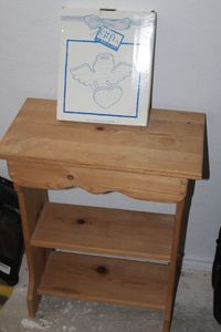 lot 201 image: Small Unfinished Wooden Shelf and Wood Angel Heart Quilt Holder By House of Lloyd