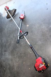 lot 251 image: Troy-Built 4-Cycle Weed EaterPole Saw, Very Lightly Used