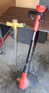 lot 273 image: Black & Decker Grass Hog Battery Powered Weed eater, No Battery or Charger, and Lawn Root Feeder