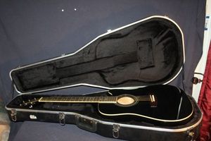 lot 12 image: Jasmine Guitar and Storage Case