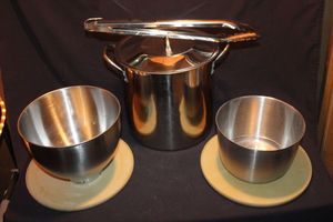 lot 314 image: Stainless Steele Stock Pot, Two Mixig bowls and lazy susans