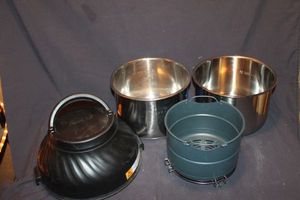 lot 317 image: Instapot air fryer lid, and basket. Two Instapot innner pots