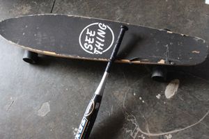 lot 431 image: Long Board and Bat