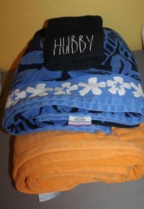 lot 452 image: Two Large Swim Towels and Hubby Hand Towel