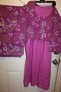lot 510 image: Incoplete Sewing Project, tons of fabric left to finish this beautiful dress.