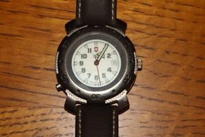 lot 15 image: Swiss Army watch with leather band
