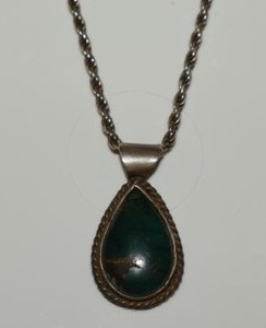 lot 23 image: Sterling silver necklace with green turquoise pendant