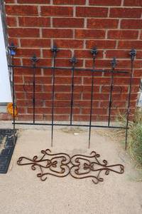 lot 224 image: Wrought iron trellisfence and wall hanging