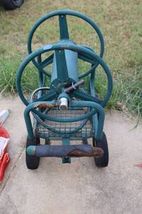 lot 250 image: Garden hose reel cart (could use some new tires)