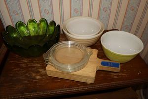 lot 33 image: Vintage Pyrex striped bowls, Small Pyrex lids, wood cutting board and green glass bowl