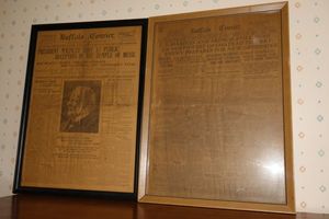lot 57 image: Framed newspapers from early 1900s