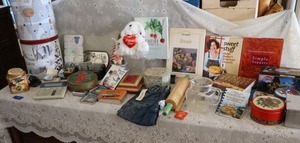 lot 59 image: Misc. lot recipe books, rolling pin with signatures, unopened match light, Childrens jeans 3T, collector tins and more
