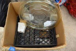 lot 228 image: Plant starter containers and plastic rolling plant stands