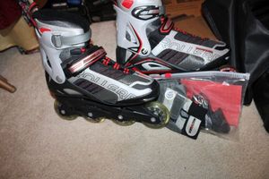lot 141 image: Mens roller blades size 8