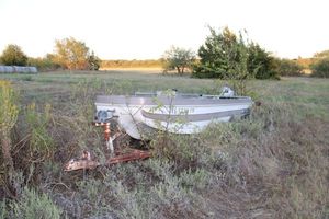 lot 261 image: Fishing boat 1976 Skeeter, has state Cert. of Title for boat and motor