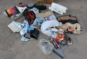 lot 205 image: Misc. tools and maps plus jumper cables and vintage ash trays