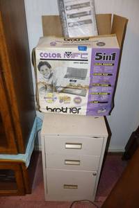 lot 107 image: Brother printer MFC 2240c still in packaging plus 2-drawer file cabinet with contents
