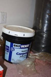 lot 97 image: Carpet roll with outdoor Carpet adhesive