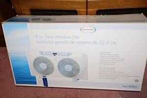 lot 112 image: 9 inch Twin Window Fan in original box