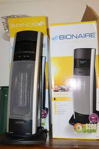 lot 115 image: Two personal heaters by Bionaire (one NEW, one used)
